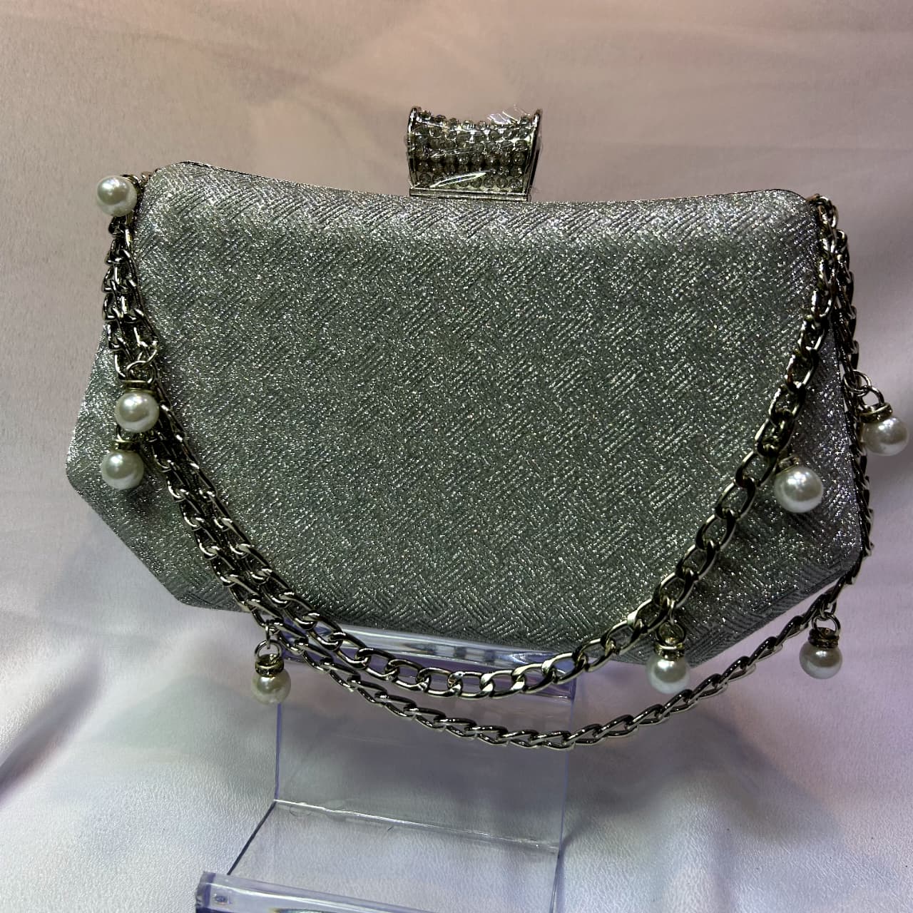 Silver Shimmer Clutch Bag with Pearl-Accented Chain Strap